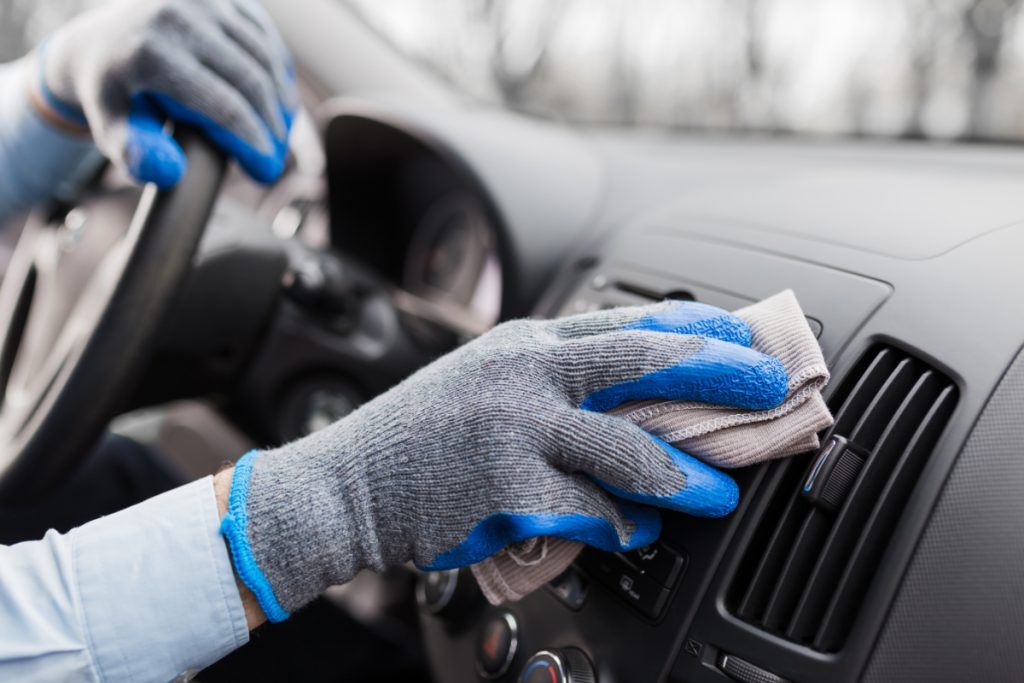 Mechanic cleaning the inside of a vehicle - Vehicle Valeting Northamptonshire